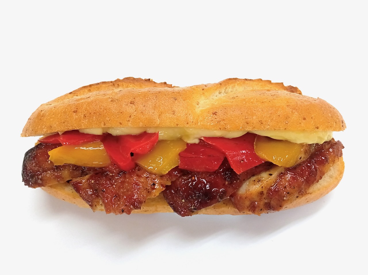 ９種類のスパイスをきかせたジャマイカ風「ジャークチキン」をレモンマヨネーズソースで仕上げたバゲットサンドです。