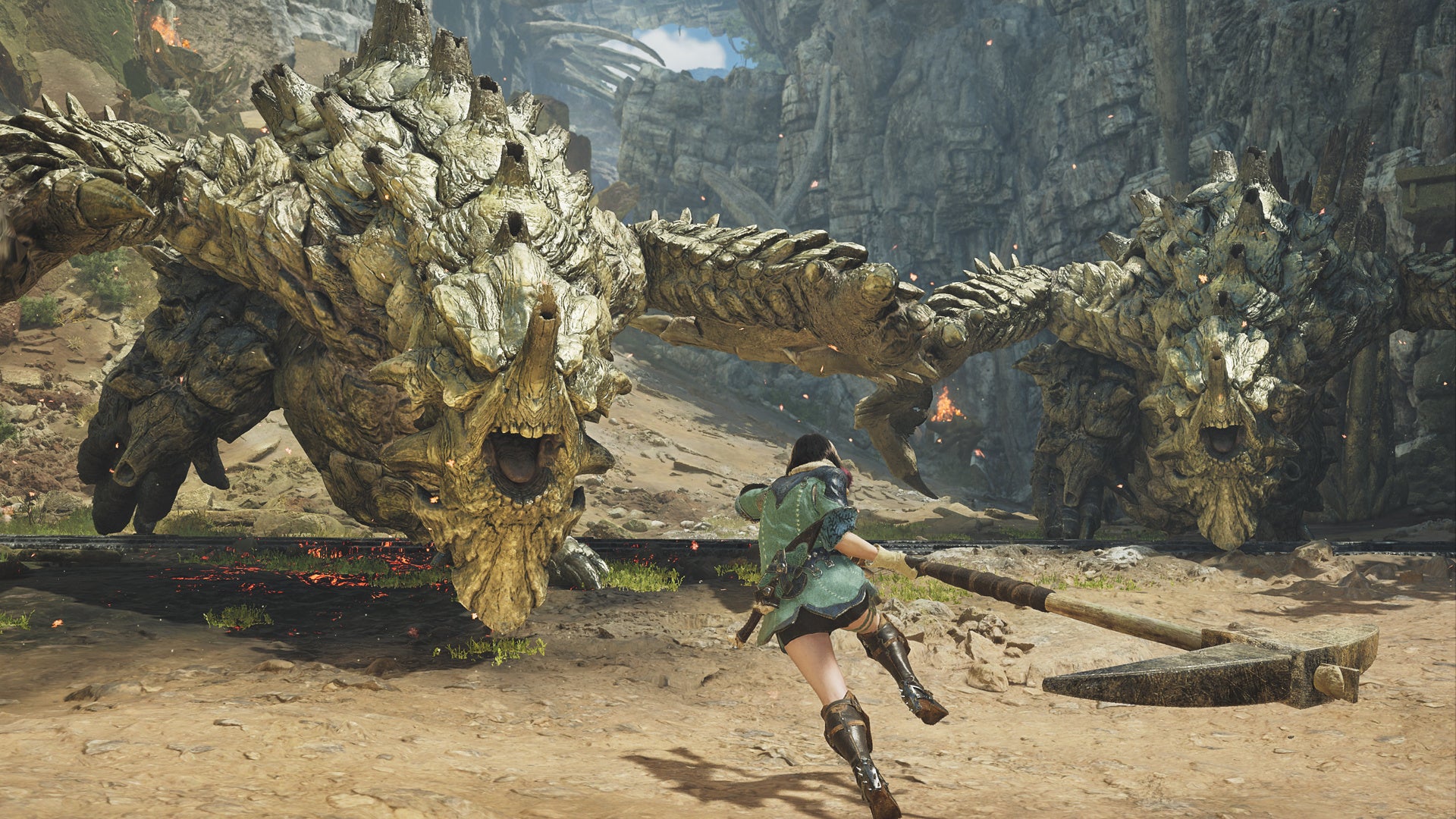 記事画像4: 巨大な岩石モンスターと戦うハンター。