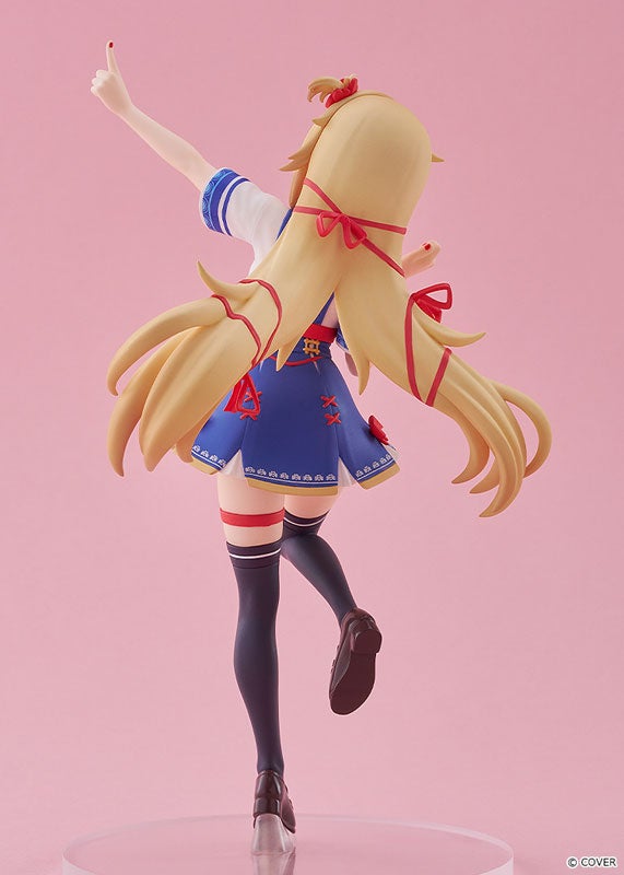 記事画像6: セーラー服を着た金髪のフィギュア。ピンクの背景。