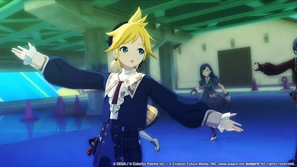 アニメ調のキャラクターがステージでパフォーマンスをしている様子。