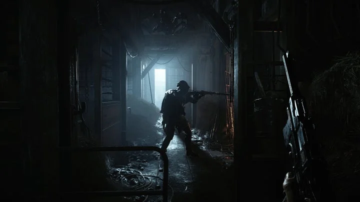 『Hunt: Showdown 1896』の暗い通路での探索シーン