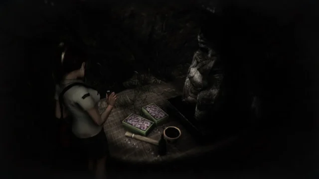 『DreadOut』のゲーム画面。リンダが暗闇で怪しい供物を見つける。