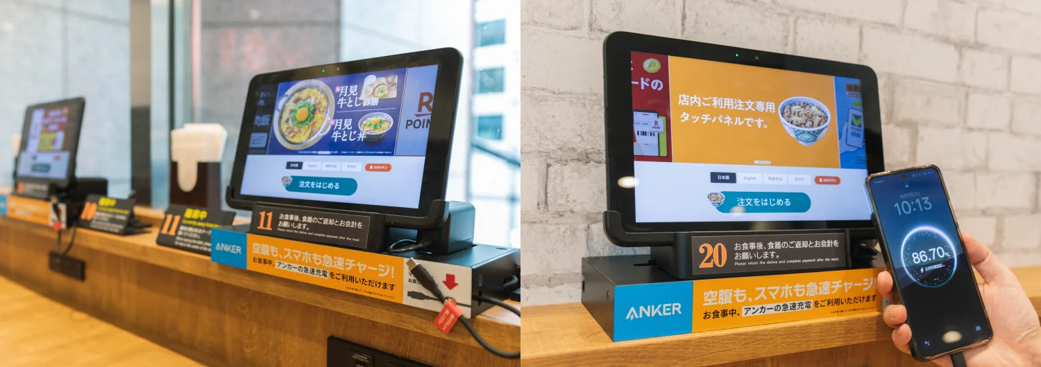 吉野家の客席に設置されたAnker充電ケーブルと注文用タブレット