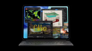 macOS Tahoeで複数のアプリが動作しているMacBook Proの画面