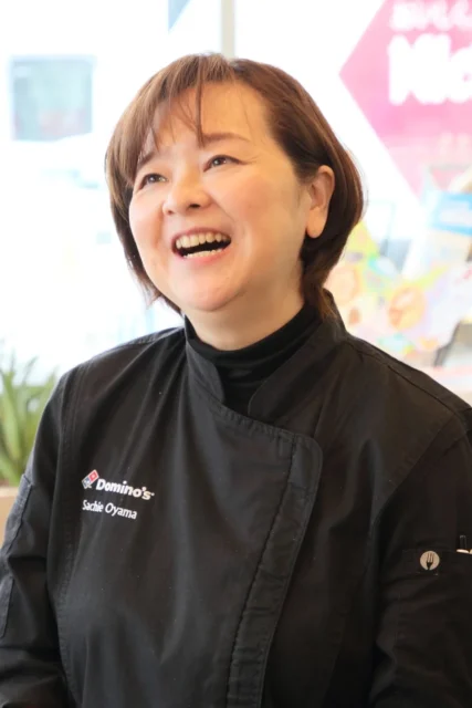 ドミノ・ピザ商品開発責任者 大山幸恵氏の笑顔