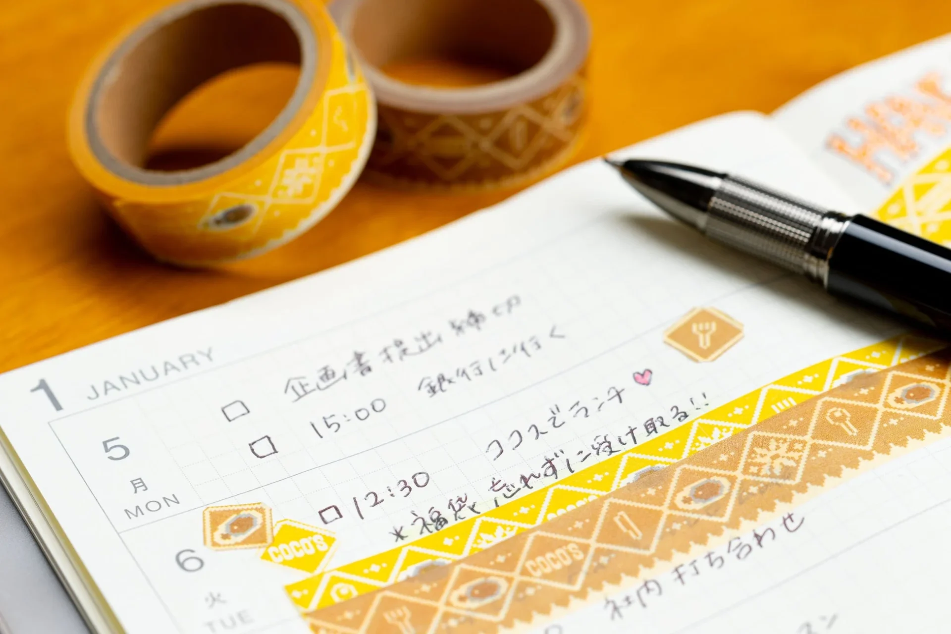 マスキングテープを手帳に貼った使用イメージ（福袋受け取りのメモ）