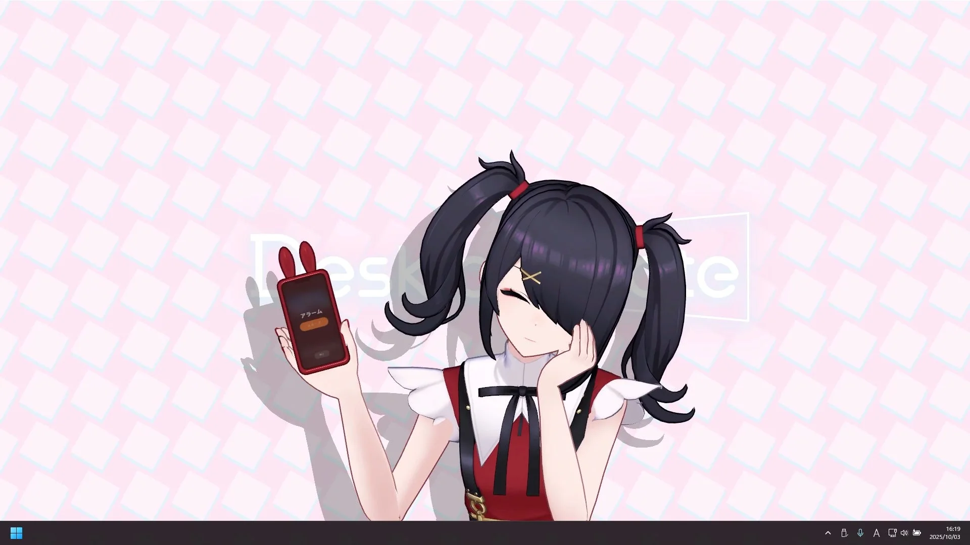 あめちゃんがデスクトップでスマホを見ている様子