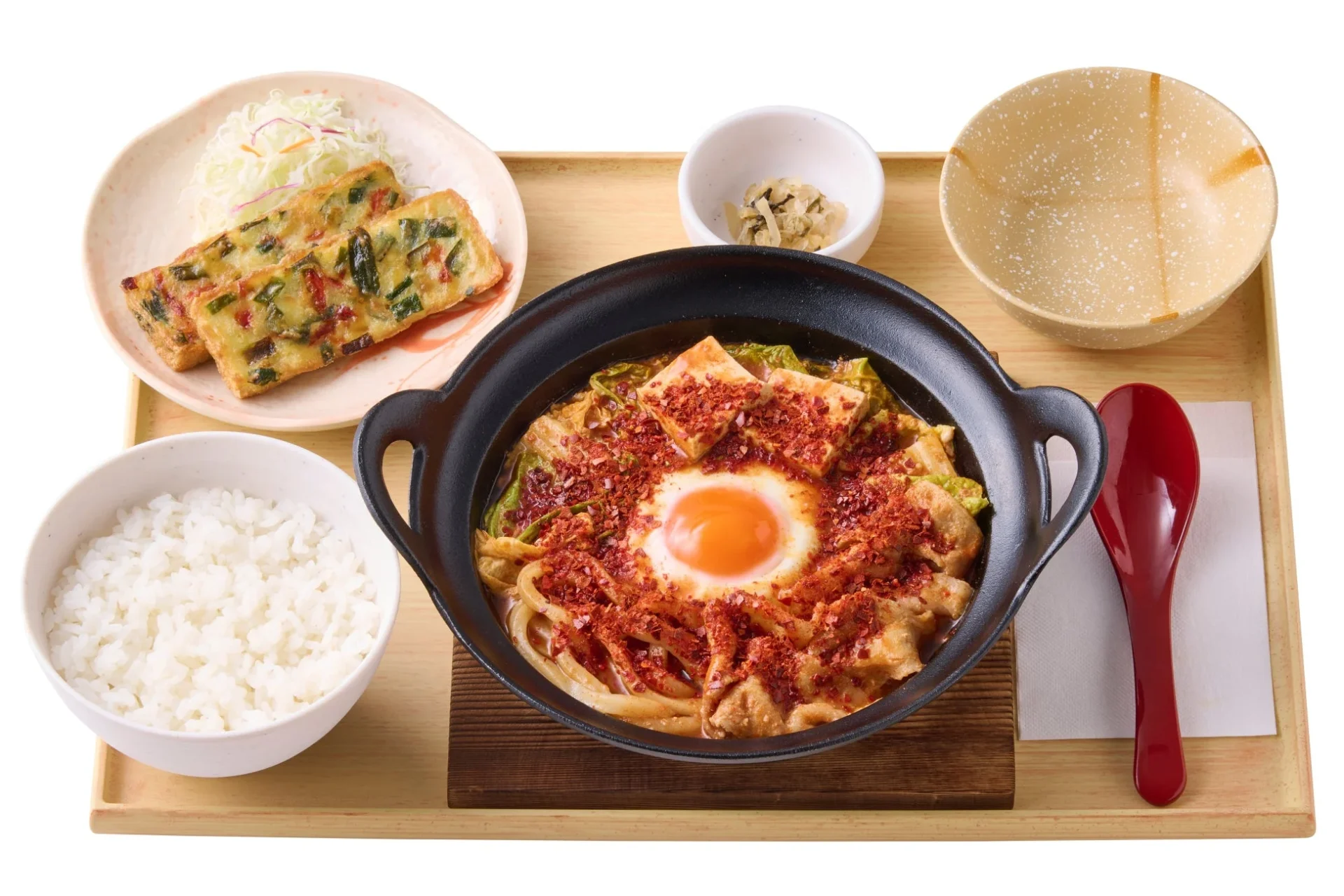 やよい軒のニラチヂミ付き辛旨チゲ定食。ご飯と小鉢も。