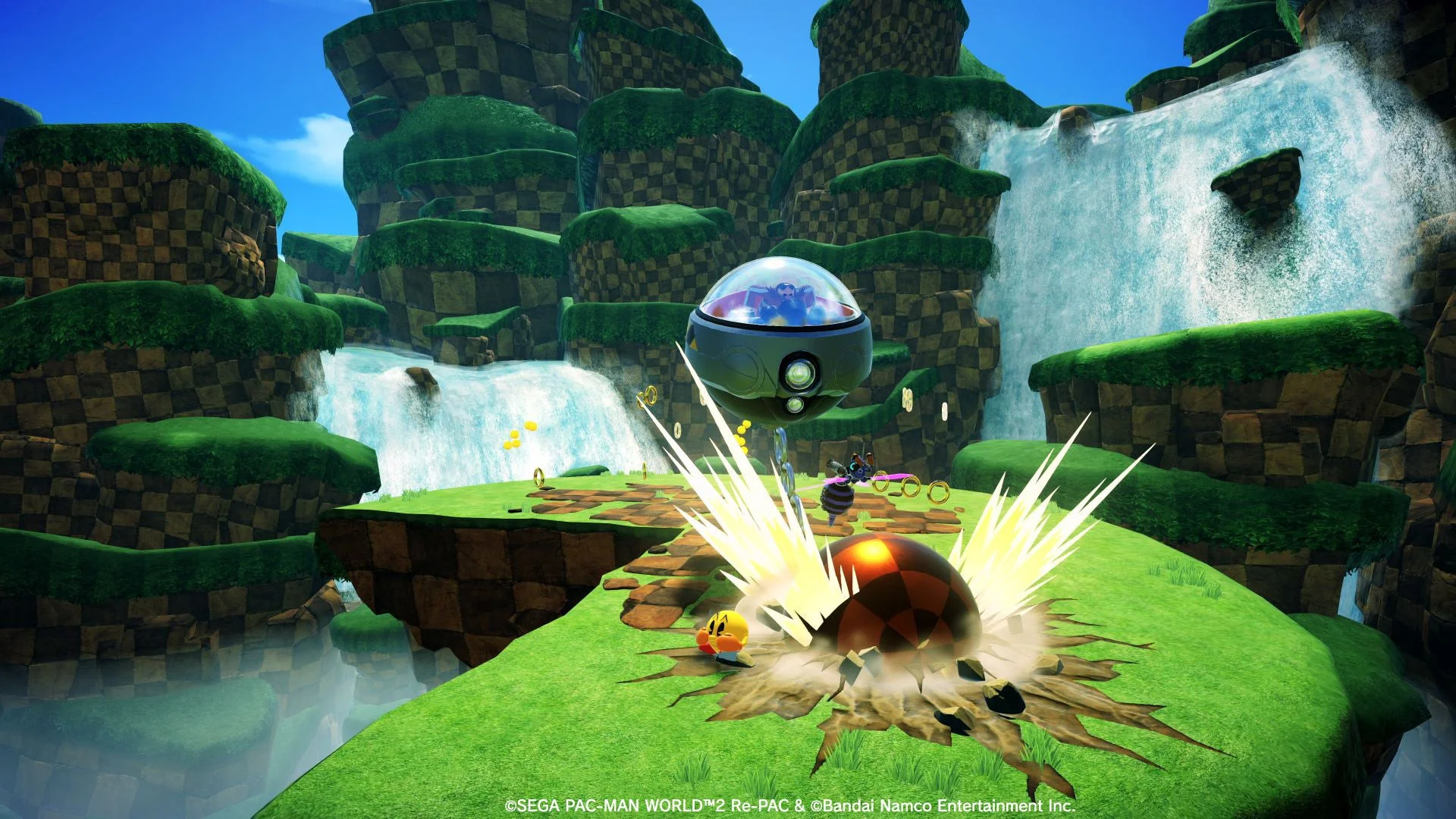 パックマンがDr.エッグマンの鉄球攻撃を避けるゲーム画面