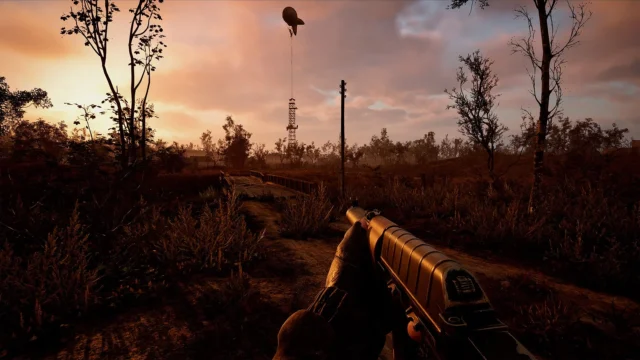 夕暮れのゾーンでショットガンを構えるゲームプレイ画面