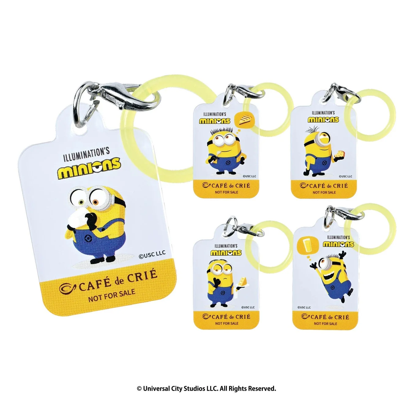 5種類のミニオンアクリルチャームとカフェ・ド・クリエのロゴ