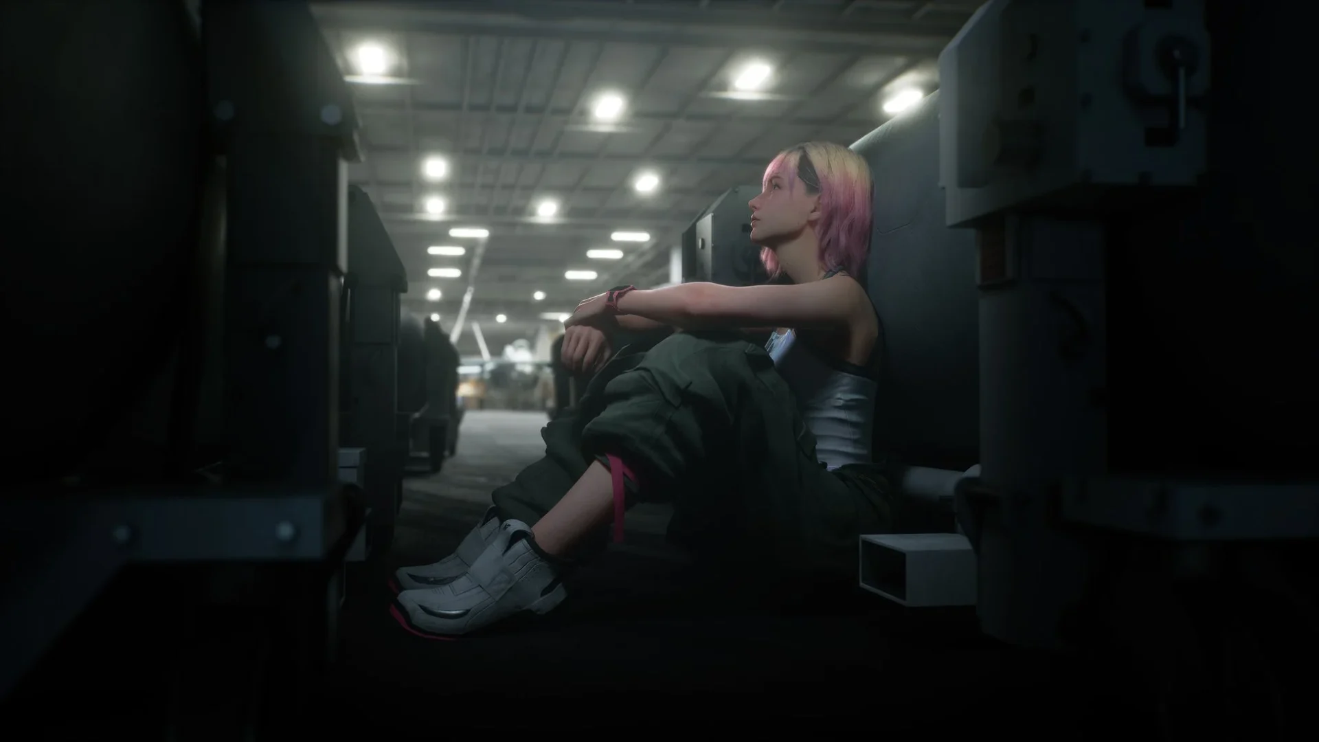 空母内で座り込む女性キャラクター