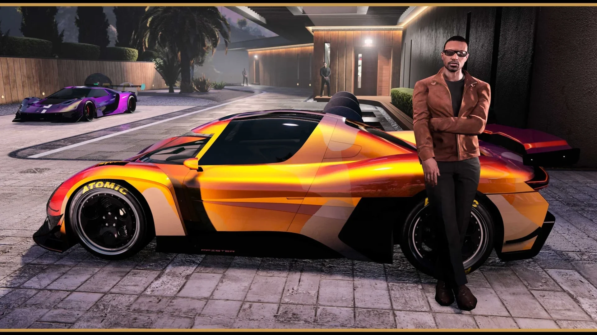 邸宅の広々としたガレージに停まる高級車