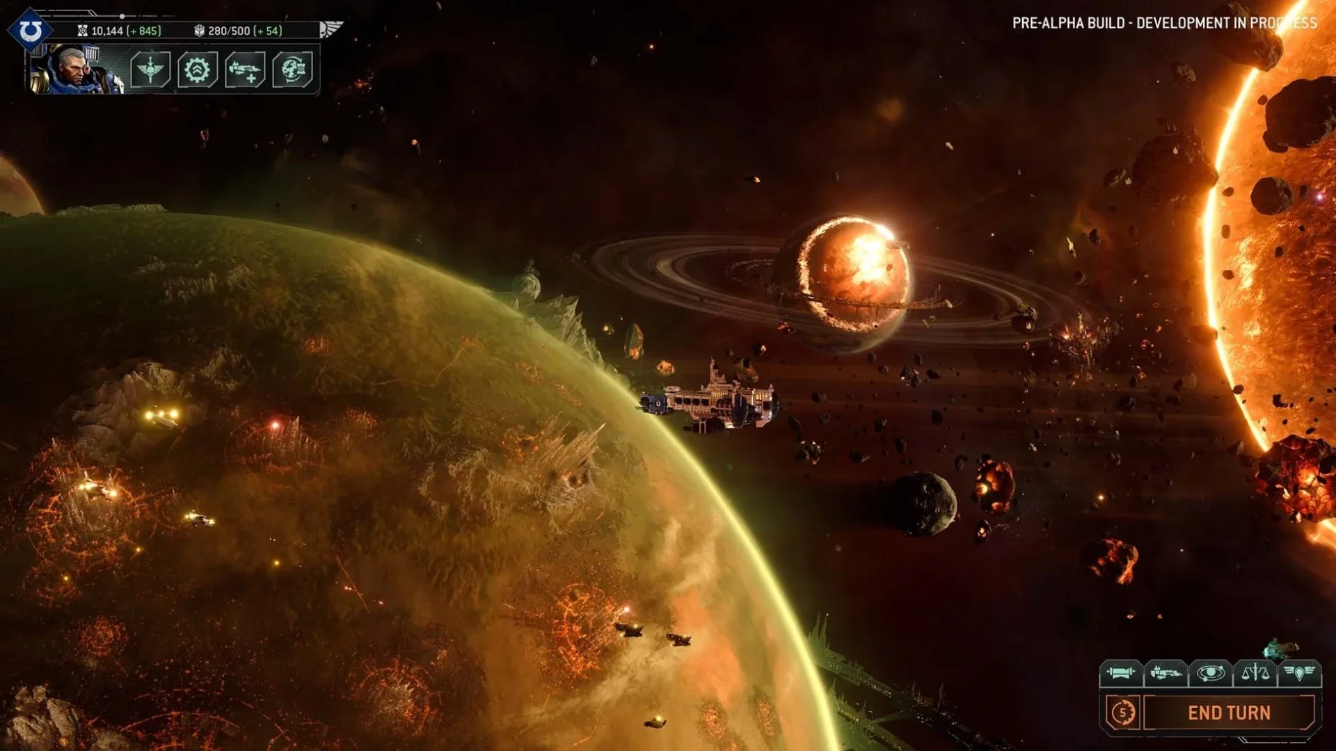 『トータルウォー:ウォーハンマー40,000』の宇宙艦隊と惑星のゲーム画面