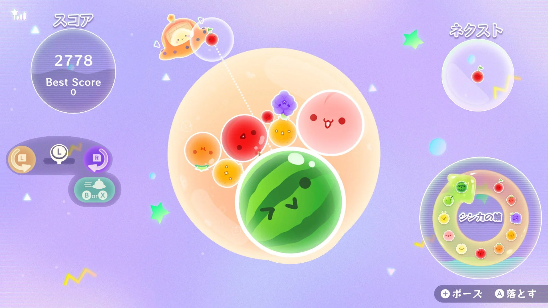 スイカゲーム ぷらねっとの惑星型ステージでのゲームプレイ画面。