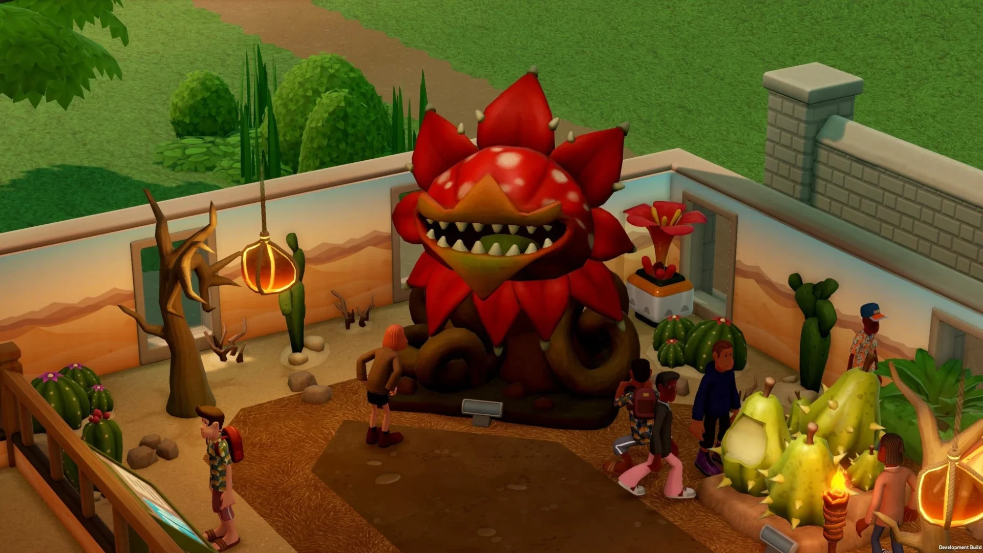 博物館に展示された巨大な食虫植物のような展示品と来場者