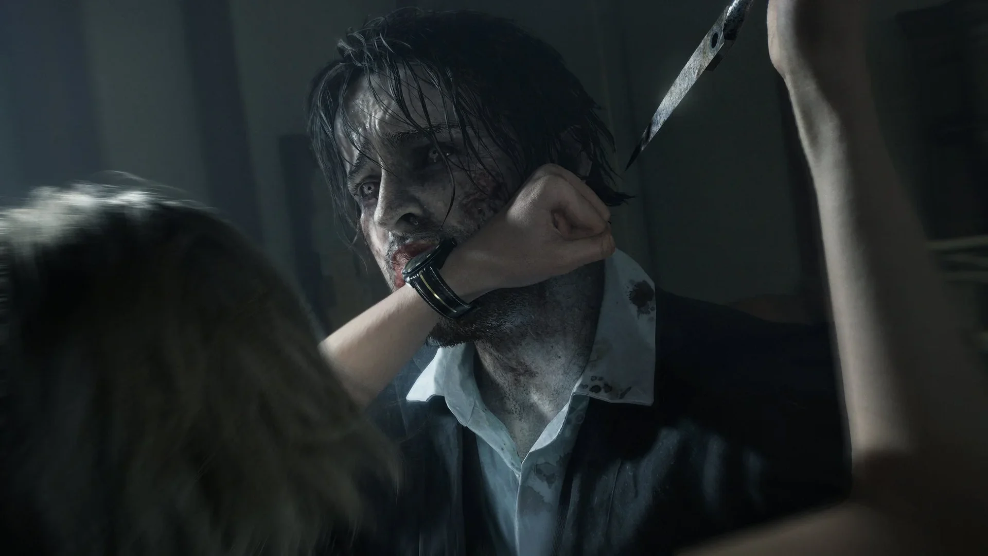 グレースがゾンビにナイフを突き立てる近接戦闘シーン。