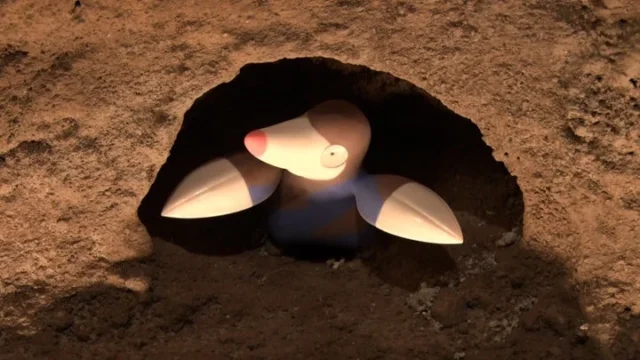 地中から顔を出すモグリューのジオラマ