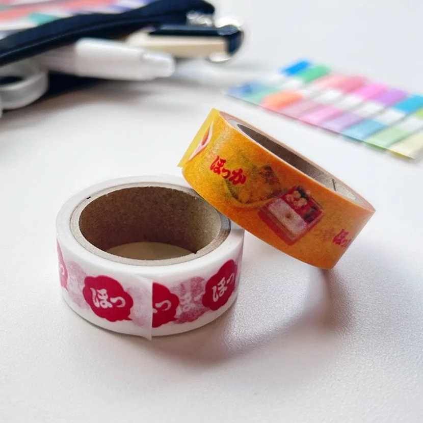 お弁当柄と「ほっ」のロゴが入った2種類のマスキングテープ