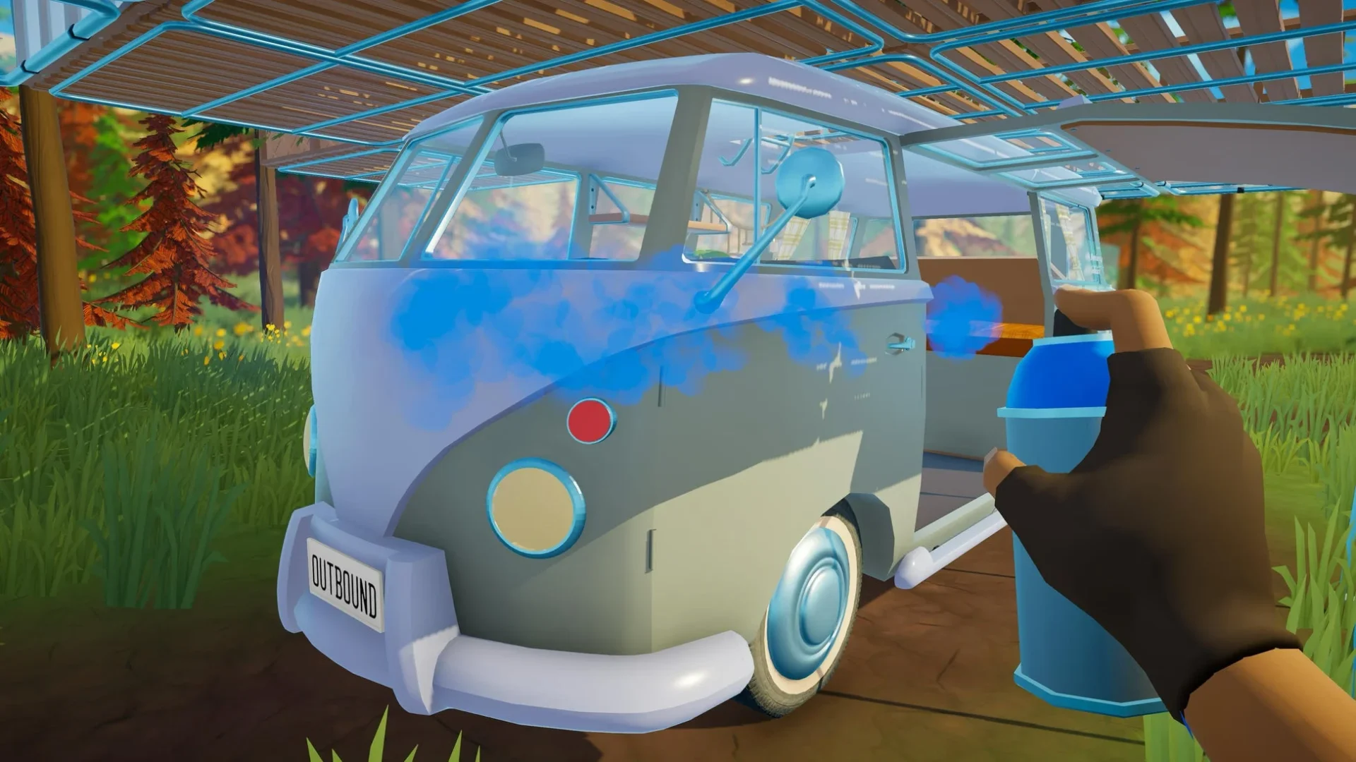 プレイヤーがキャンピングカーをスプレーで塗装している様子