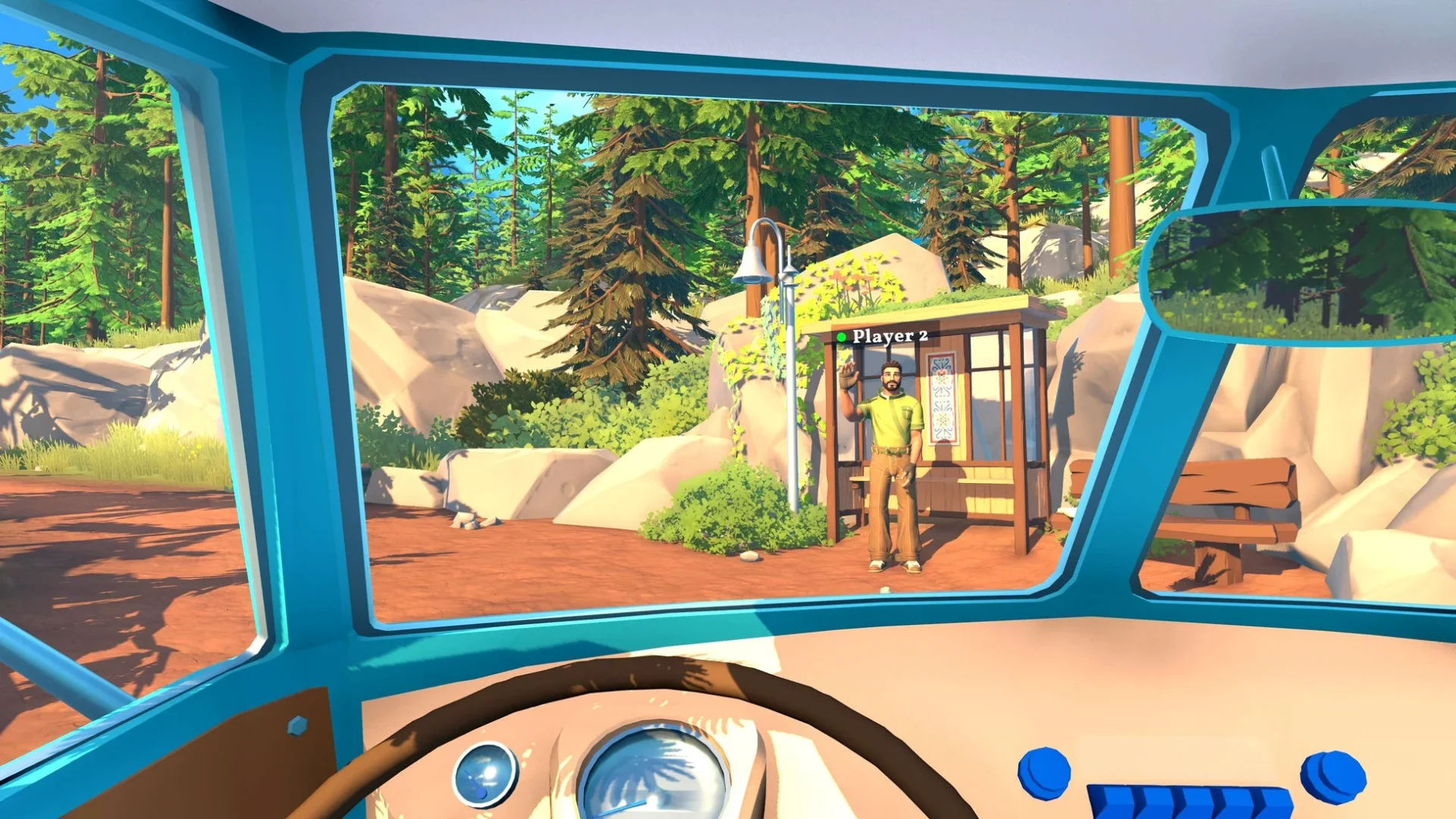 キャンピングカーの運転席から見た、仲間が待つ停留所の風景