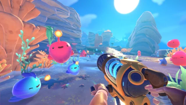Slime Rancher 2のゲームプレイ画面：スライムを吸引する様子