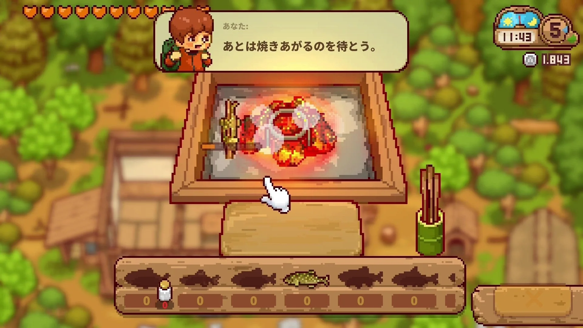 囲炉裏で魚を焼く調理画面