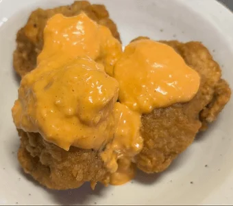 タルタルチキン南蛮丼のチキン部分