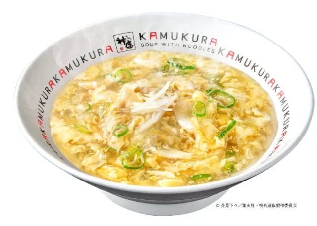 秤金次の熱を愛する炒飯。醤油ベースの玉子あんかけがかかっている。