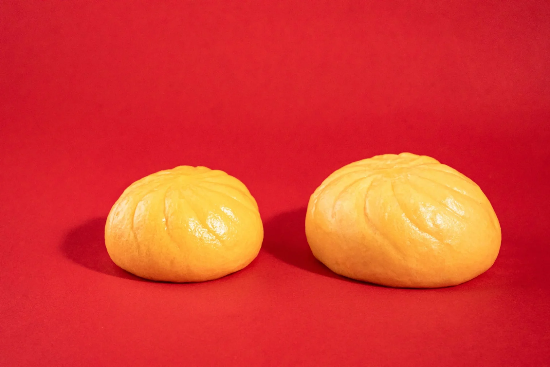 のびーるチーズのコク旨ピザまん通常品と増量品の比較